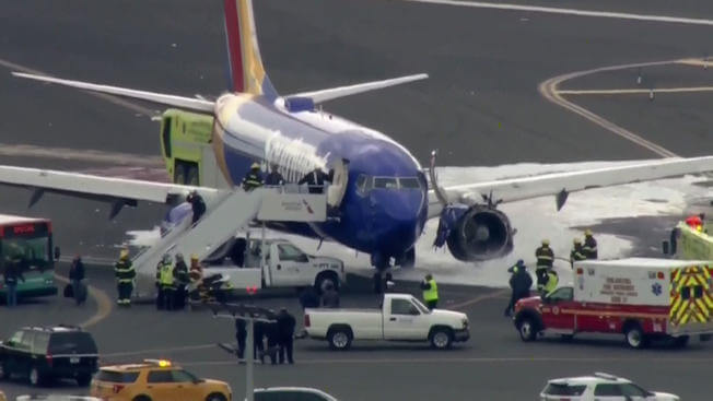 Woman Partially Sucked Out of Southwest Plane After Mid-Air Explosion