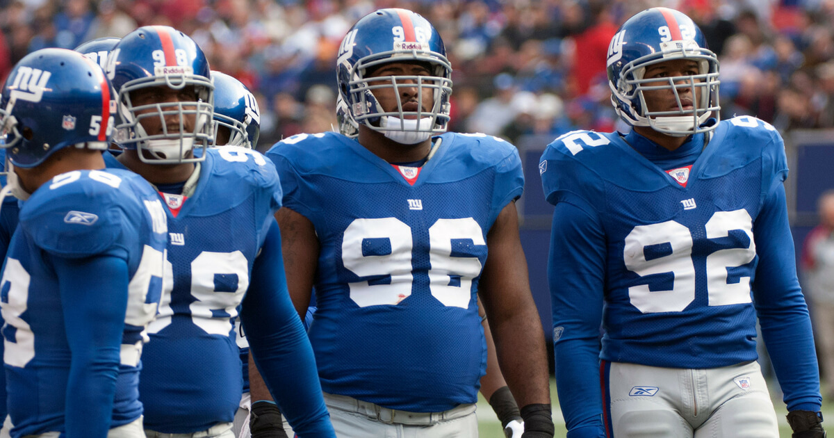 Barry Cofield #96 of the New York Giants looks on against the Tampa Bay Buccaneers during an NFL football game at Giants Stadium on October 29, 2006 in East Rutherford, New Jersey.