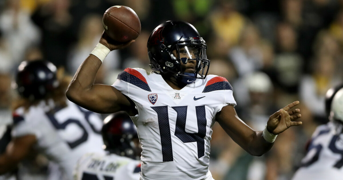 Univ. of Arizona quarterback Kahlil Tate looks for a receiver in a 2017 game at Colorado