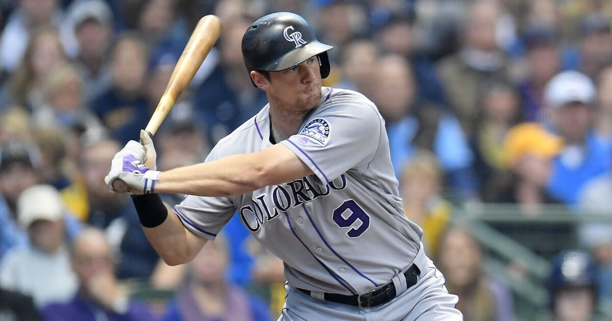 D.J. LeMahieu bats for the Colorado Rockies in Game 2 of the NL Divisional Series against the Milwaukee Brewers at Miller Park on Oct. 5, 2018.