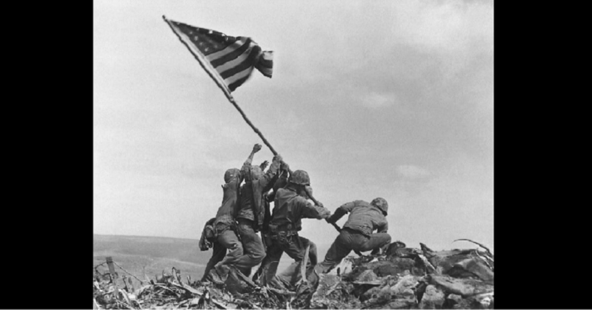 Photo of Marines raising the flag on Iwo Jima.