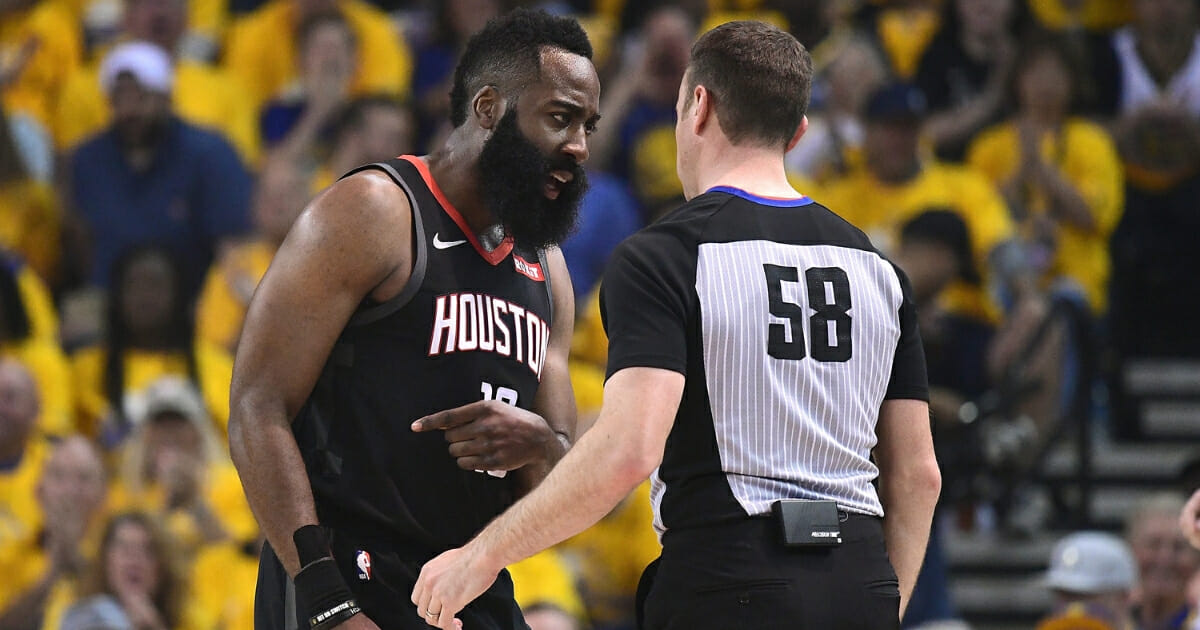 James Harden of the Houston Rockets complains over a foul call on him against the Golden State Warriors to referee Josh Tiven during Game One of the Second Round of the 2019 NBA Western Conference Playoffs at ORACLE Arena on April 28, 2019 in Oakland, California.