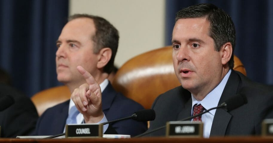 House Intelligence Committee ranking member Rep. Devin Nunes (R-California), right, questions former Ambassador to Ukraine Marie Yovanovitch during a hearing in the Longworth House Office Building on Capitol Hill on Nov. 15, 2019, in Washington, D.C.