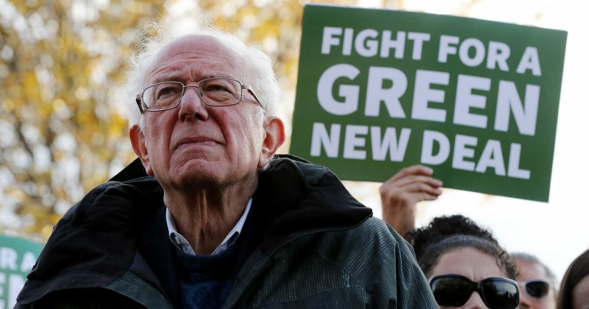 Democratic presidential candidate Sen. Bernie Sanders of Vermont attends a news conference to introduce legislation to transform public housing as part of the Green New Deal outside the U.S. Capitol on Nov. 14, 2019, in Washington, D.C.