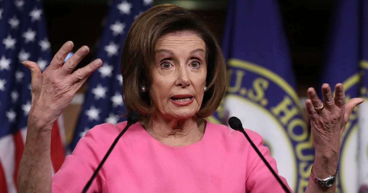 House Speaker Nancy Pelosi of California speaks during a news conference March 26, 2020, in Washington.