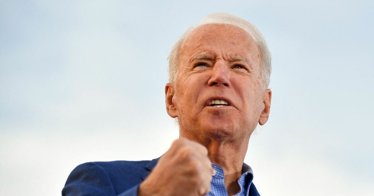 Democratic presidential candidate former Vice President Joe Biden gestures as he speaks during a campaign rally at the WWI Museum and Memorial in Kansas City, Missouri on March 7, 2020.