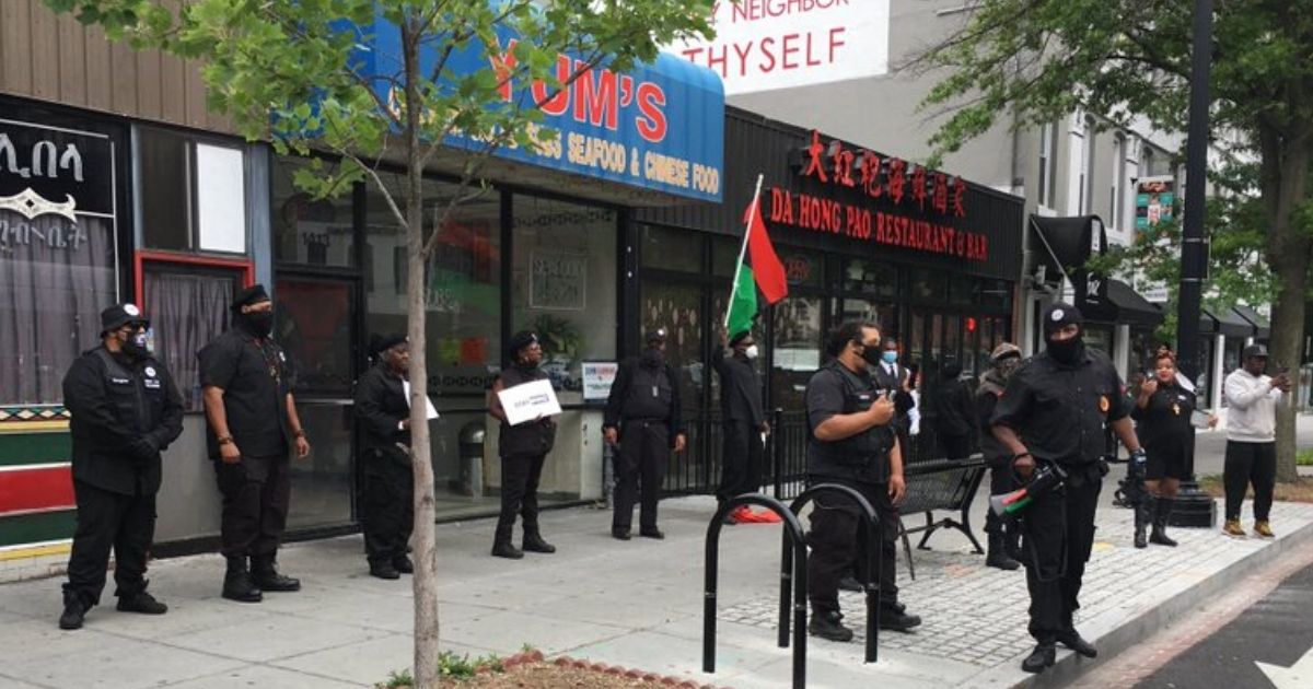 The New Black Panther Party pickets a Washington, D.C. restaurant.