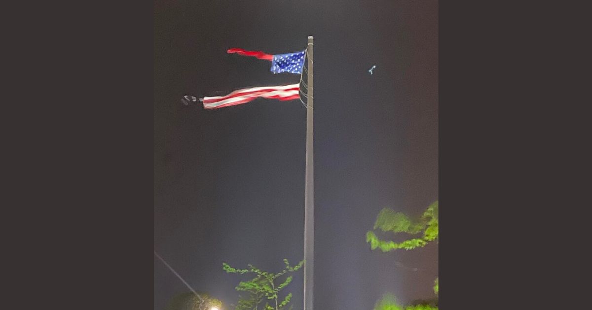 The largest free-flying American flag in the world has been shredded by a violent storm.