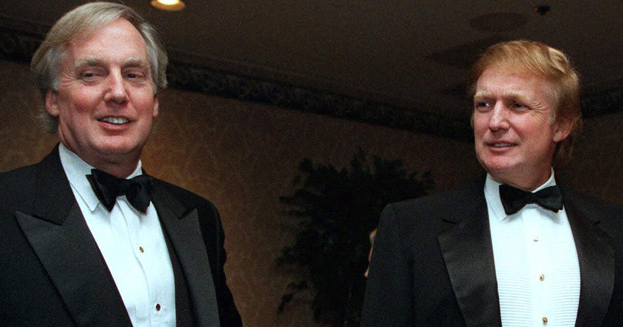 In this Nov. 3, 1999, file photo, Robert Trump, left, joins Donald Trump at an event in New York.