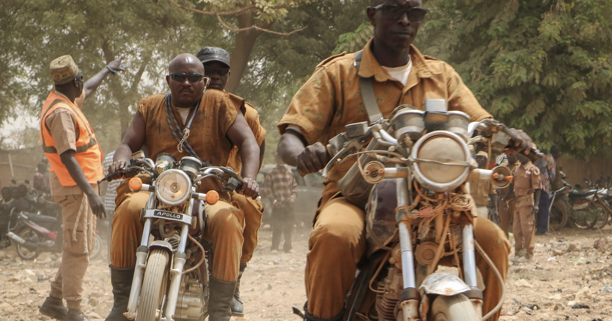 A group of local defense force fighters drive their motorbikes in Ouagadougou, Burkina Faso, on March 14, 2020. In an effort to combat rising jihadist violence, Burkina Faso’s military has recruited volunteers to help it fight militants.