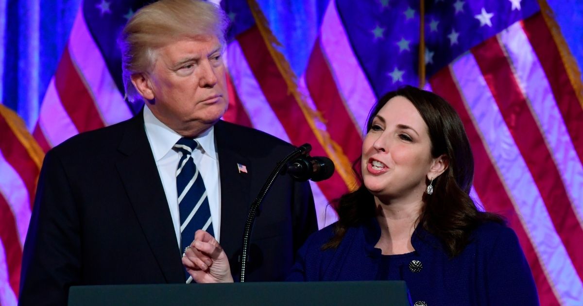 In this Dec. 2, 2017, photo, Republican National Committee Chairwoman Ronna McDaniel, right, speaks at a fundraiser in New York with President Donald Trump.