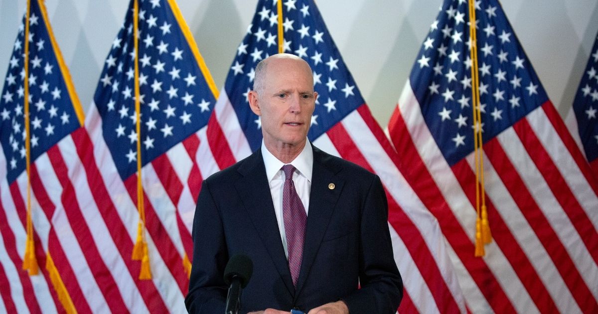 WASHINGTON, DC - AUGUST 06: U.S. Sen. Rick Scott (R-FL) speaks to members of the media in the Hart Senate Office Building on Capitol Hill on August 6, 2020 in Washington, DC. Senate Majority Leader Mitch McConnell (R-KY) is allowing Senators to leave Washington for the week following the confirmation vote for John Cronan to be U.S. District Judge for the Southern District of New York, as negotiations for a new COVID-19 relief package continue.