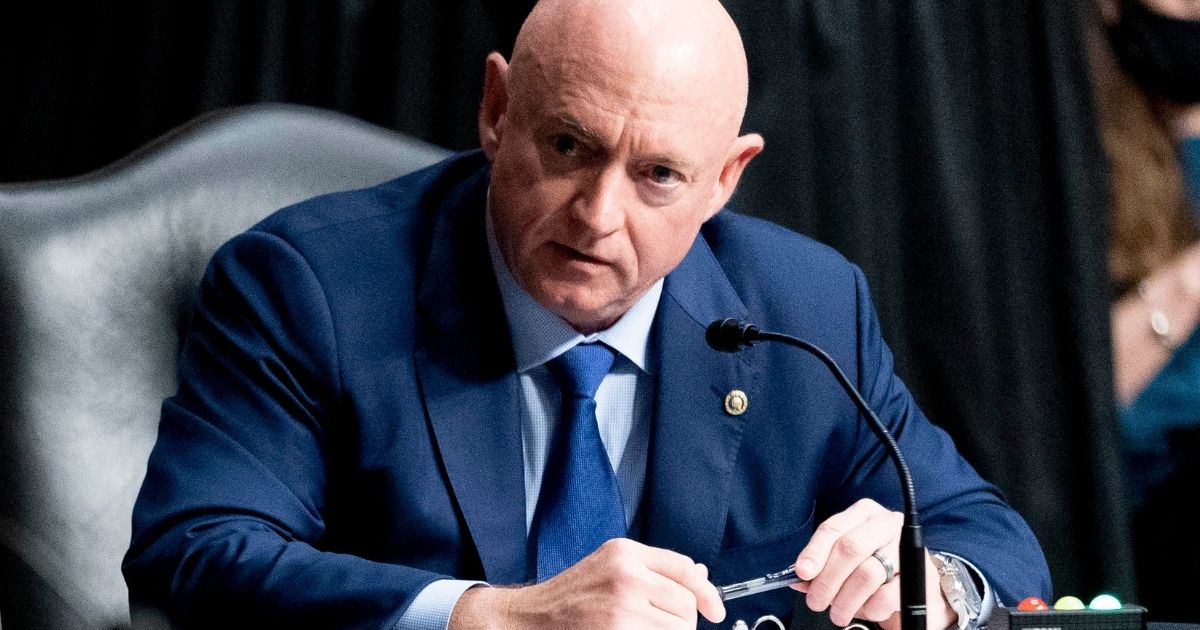 Democratic Sen. Mark Kelly of Arizona asks questions during a hearing on Capitol Hill in Washington on March 25.