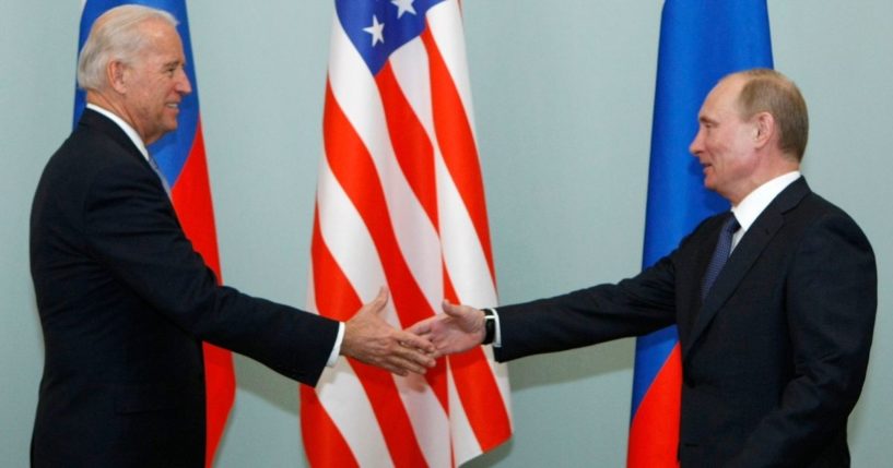 Then-Vice President Joe Biden shakes hands with Russian Prime Minister Vladimir Putin in Moscow on March 10, 2011.