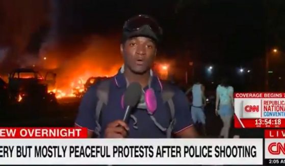 A chyron on CNN describes the riot in Kenosha, Wisconsin, as "fiery but mostly peaceful."