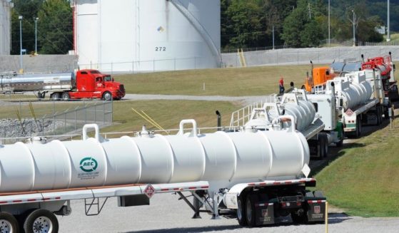 This Sept. 16, 2016, file photo shows tanker trucks lined up at a Colonial Pipeline Co. facility in Pelham, Alabama.