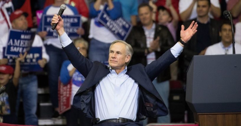 Gov. Greg Abbott of Texas addresses the crowd at a rally in support of Sen. Ted Cruz on Oct. 22, 2018, at the Toyota Center in Houston.