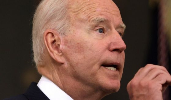 President Joe Biden speaks in the State Dining Room of the White House in Washington on May 5.