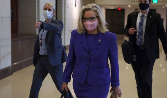 Wyoming GOP Rep. Liz Cheney arrives for a caucus meeting in the U.S. Capitol Visitors Center on Wednesday in Washington, D.C.