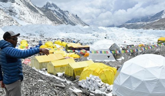 Nepalese mountaineer Kami Rita poses for a picture at the Everest base camp on May 2, 2021.