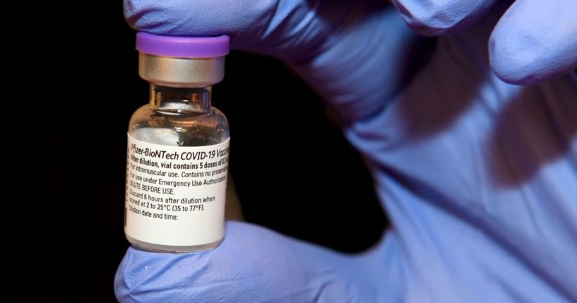 A vial of the Pfizer-BioNTech COVID-19 vaccine is displayed at UNLV in Las Vegas on Jan. 12.