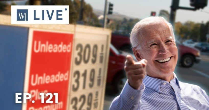 At right, then-Democratic presidential candidate Joe Biden speaks in Philadelphia on May 18, 2019. At left is a sign showing high gas prices.