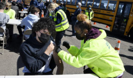 Brian Acevedo, 16, receives a COVID-19 vaccination in East Hartford, Connecticut, on April 26, 2021.