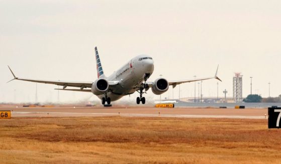 An American Airlines Boeing 737 MAX airplane takes off on a test flight from Dallas-Fort Worth International Airport in Dallas, Texas, on Dec. 2, 2020.