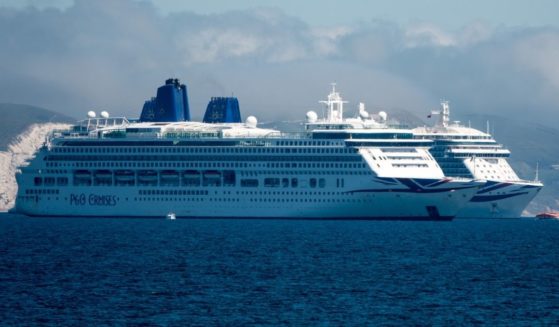 A cruise ship remains anchored in the English Channel off the Dorset coast as the industry remains at a standstill due to the ongoing coronavirus pandemic on June 13, 2021, in Weymouth, England.