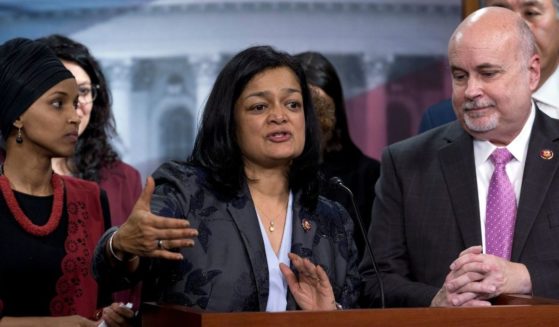 Rep. Pramila Jayapal of Washington, accompanied by fellow Democratic Reps. Ilhan Omar of Minnesota, left, and Mark Pocan of Wisconsin, speaks during a news conference on Capitol Hill in Washington on Jan. 8, 2020.