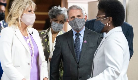 First lady Jill Biden and Dr. Anthony Fauci, director of the National Institute of Allergy and Infectious Diseases, speak with members of Abyssinian Baptist Church on Sunday in New York City.