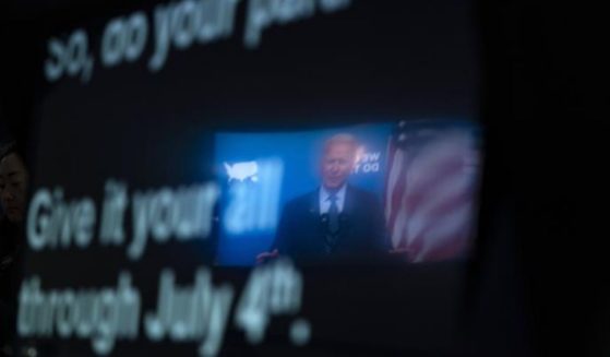 President Joe Biden speaking from a teleprompter