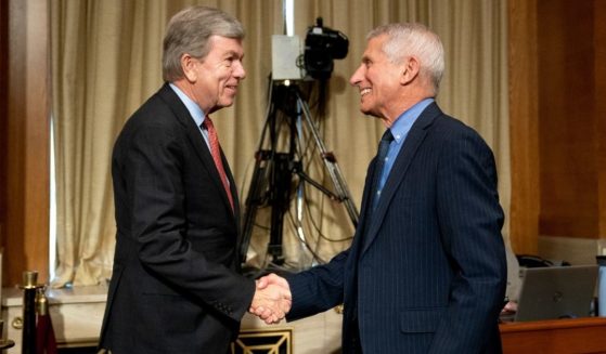 Republican Sen. Roy Blunt of Missouri, left, shakes hands with Dr. Anthony Fauci, Director of the National Institute of Allergy and Infectious Diseases, following a Senate Appropriations Subcommittee hearing on May 26, 2021, on Capitol Hill in Washington, D.C.