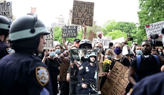 New York City police square off with demonstrators in June 2020 in Manhattan's Washington Square Park.