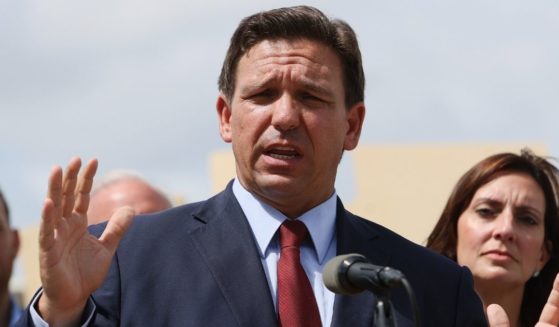 Florida Gov. Ron DeSantis speaks during a news conference held at the Florida National Guard Robert A. Ballard Armory on Monday in Miami.