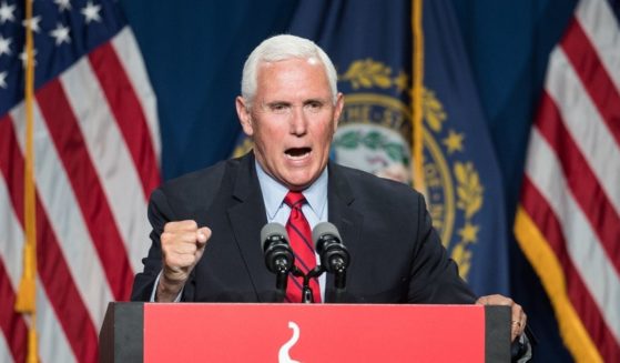 Former Vice President Mike Pence addresses the GOP Lincoln-Reagan Dinner on June 3 in Manchester, New Hampshire.