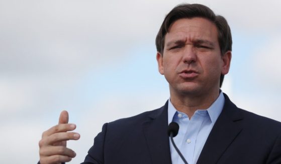 Florida Gov. Ron DeSantis speaks during a news conference in the Hard Rock Stadium parking lot on March 30, 2020, in Miami Gardens, Florida.