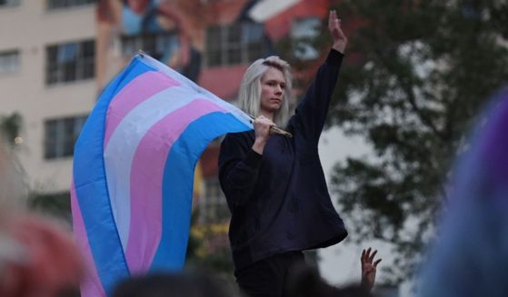 Pro-transgender activists hold a rally and march to city hall in Los Angeles on Nov. 2, 2018.