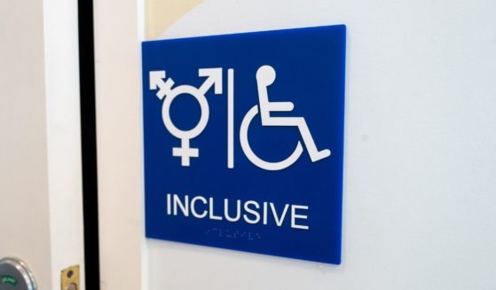 A sign for an inclusive restroom, with the symbol indicating male, female and transgender, as well as handicapped symbol, as part of LGBT rights initiatives in the Mission District neighborhood of San Francisco on July 18, 2019.