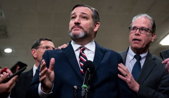 Republic Sens. Ted Cruz of Texas and Mike Braun of Indiana speak to the media during a dinner break in the Senate impeachment trial at the U.S. Capitol Jan. 27, 2020, in Washington, D.C.