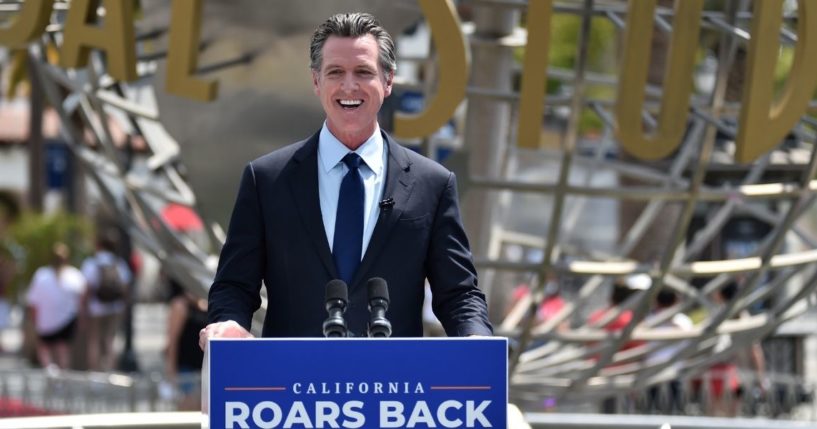 California Gov. Gavin Newsom attends a news conference for the official reopening of the state at Universal Studios Hollywood on June 15, 2021, in Universal City, California.