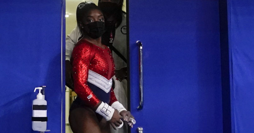 Simone Biles leaves a medical station during the artistic gymnastics women's final at the 2020 Summer Olympics in Tokyo on Tuesday.