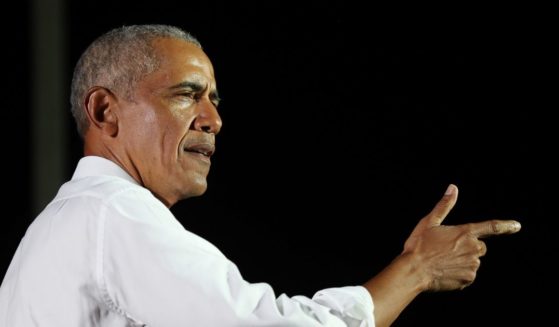 Former President Barack Obama speaks in support of then-Democratic presidential nominee Joe Biden during a drive-in rally at the Florida International University on Nov. 2, 2020, in Miami.