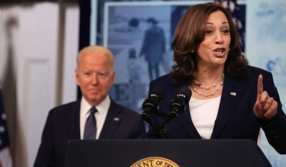 Vice President Kamala Harris, right, and President Joe Biden deliver remarks in the South Court Auditorium in the Eisenhower Executive Office Building on July 15, 2021, in Washington, D.C.