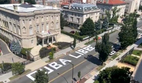 The words "Cuba Libre" are seen in the street in front of the Cuban embassy in Washington.