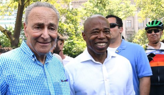 Senate majority Leader Chuck Schumer and New York City Democratic mayoral nominee Eric Adams attend "Hometown Heroes" Ticker Tape Parade on Wednesday in New York, New York.
