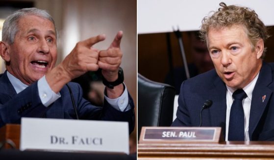 Dr. Anthony Fauci, left, responds to accusations by Kentucky Republican Sen. Rand Paul, right, during questioning before the Senate Health, Education, Labor and Pensions Committee on Capitol Hill in Washington on Tuesday