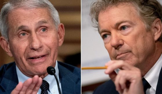 Dr. Anthony Fauci, left, director of the National Institute of Allergy and Infectious Diseases, faced tough questions from Republican Sen. Rand Paul of Kentucky, right, during a Senate Health, Education, Labor, and Pensions Committee hearing on Capitol Hill in Washington on Tuesday.