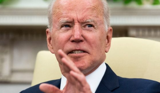 President Joe Biden speaks during a meeting in the Oval Office in Washington on Monday.