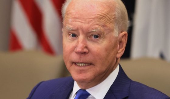 President Joe Biden speaks during a meeting in the Roosevelt Room of the White House in Washington on Monday.